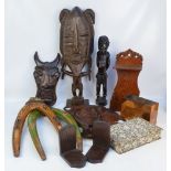 A collection of treen including an African carved tribal figure of a chained man,