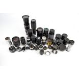 A large collection of lenses including a Pentacon Auto 2.8/135, a Sigma Zoom-KII 1:4.