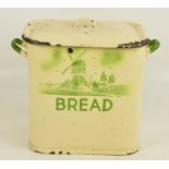 A vintage enamel twin handled bread bin of rounded rectangular form decorated with a windmill scene,