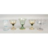 A pair of early 20th century Continental liqueur glasses with pale brown tinted bowls with green