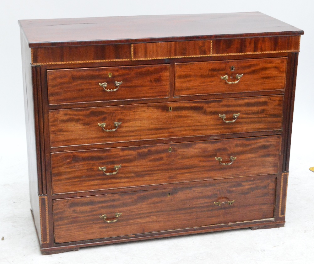 An early 20th century inlaid chest of drawers with frieze drawer above two short and three long