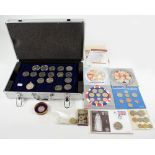 A quantity of British coins, including some pre-1947 silver coins including two crowns,