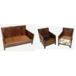 A 1920s mahogany framed and leatherette upholstered three piece lounge suite.