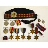 A collection of WWII medals comprising two 1939-1945 War Medals, a 1939-1945 Defence Medal,