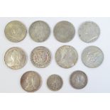 A mixed quantity of coins including three Victorian crowns, a Victorian half crown,