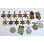 A collection of WWII medals comprising four War Medals (one without suspender), a Defence Medal,