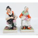 A pair of 19th century Staffordshire figures 'Cobbler and his Wife',