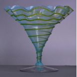 JAMES POWELL WHITEFRIARS; a blue opal flared vase with applied lime green spiral trail decoration,