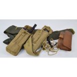 Two military issue canvas pouches, containing magazines for a gun,