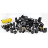 A large collection of lenses including a Clubman MC Auto Zoom 1:4-5.