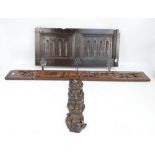 A section of 17th century oak coffer now set with three wrought iron coat hooks,