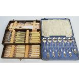 A cased set of six electroplated Art Nouveau style dessert spoons and pastry forks and a cased set