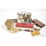 A quantity of military field accessories to include a sewing repair roll, a canteen,