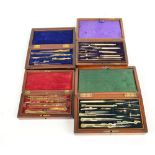 Four boxed composite and part sets of drawing instruments including a rosewood cased example and