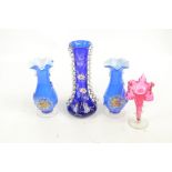 Group of decorative glassware comprising a pair of blue dipped baluster vases with clear bases and