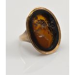 A Georgian rose metal ring set with large oval intaglio depicting the head of a young woman, 3.