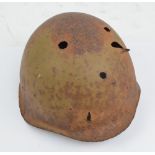 A shrapnel damaged helmet, skin only.