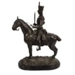 A large modern decorative bronze of a soldier upon horseback raised on an oval plinth, height 57cm.