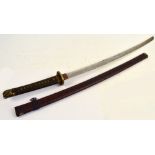 A Japanese katana with shagreen bound grip, floral decorated tsuba, length of blade 63cm,