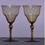 JAMES POWELL WHITEFRIARS; a pair of pale amber/pale brown glasses with double ogee bowl,