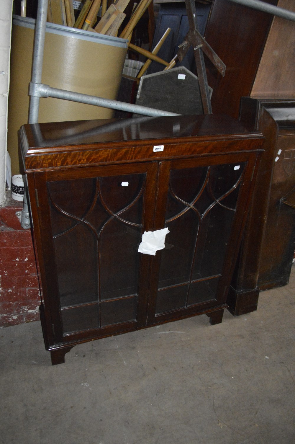 A mid 20th century mahogany glazed display cabinet.