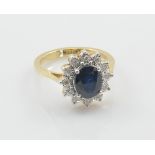 A 9ct yellow gold sapphire and diamond ring,