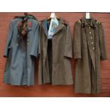 A WWII Russian wool great coat, a further post war great coat with hammer and sickle buttons,