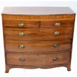 An early 19th century mahogany bowfronted chest of two over three drawers.