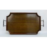 An Edwardian figured mahogany galleried tray with canted corners,