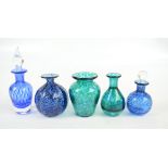Five pieces of Teign Valley glass comprising a green and blue baluster vase, a further bottle vase,