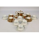 A chrysanthemum Heron Cross Pottery 'Abbeydale' pattern tea set comprising oval teapot, cream jug,