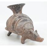 A Mayan vase modelled as an armadillo, probably 19th century, length 33cm.