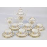 A Coalport 'Spanish Lace' pattern coffee set comprising a footed coffee pot, a cream jug,