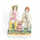 A large 19th century Staffordshire figure group 'Tam O'Shanter and Souter Johnny', height 33cm.