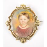 A late 19th century oval miniature on ivory portrait depicting a young girl, glazed to verso,