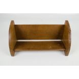 ROBERT 'MOUSEMAN' THOMPSON; an oak book trough with curved ends, one bearing the mouse prominently,