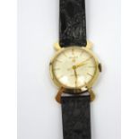 Gruen; a c1940s gentlemen's wristwatch, 10ct gold filled round case with unusual horn-shaped lugs,