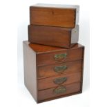 A bank of four mahogany drawers, width approx 31cm and a further pair of similar mahogany boxes (3).