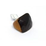 A large tiger's-eye ring, size M.