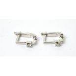 A pair of 18ct white gold earrings set with diamonds in square setting, approx 3.2g.