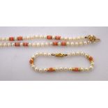 A necklace strung with coral and pearl beads on a 9ct floral pearl-set clasp, with similar bracelet,