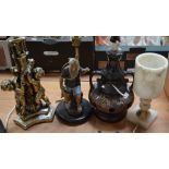 Four table lamps to include a West German ceramic example, a plaster cherubic example,