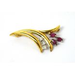 An 18ct yellow gold floral sprig brooch set with pink topaz and diamonds, approx 4.1g.