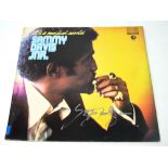 A signed record; 'It's a Musical World' by Sammy Davis Jnr,