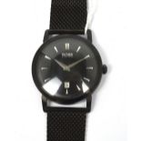 Hugo Boss; a gentlemen's 'Boss' wristwatch, circular black dial set with silvered baton numerals,