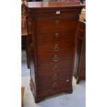 A Simon Horn contemporary mahogany seven-drawer chest of drawers with moulded sides and ornate