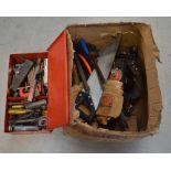 A large quantity of tools part-contained within a red-painted toolbox, to include planes,