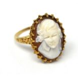 A 9ct yellow gold cameo ring with deep carved bust of a woman with flowers in her hair, size R 1/2,