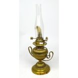 An early 20th century brass oil lamp in the form of a Grecian urn.