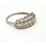 A 9ct white gold three-row white stone set ring, size N, approx 2.4g.